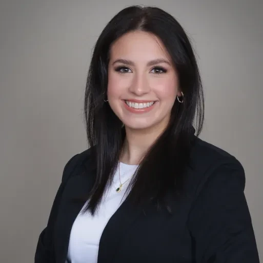 A headshot portrait of Olivia Mistichelli