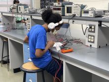 DeShawn Lindsay works on a project in an engineering lab.