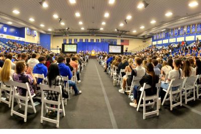 Students sit in rows at Academic Convocation.