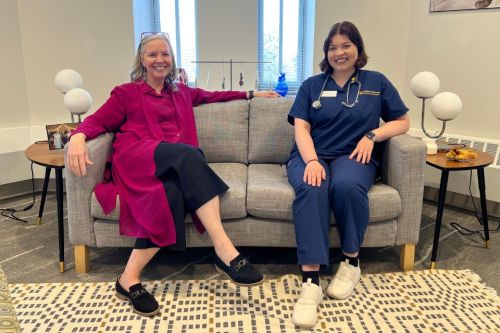 President for a day Robertson Martin 960 x 640 President Stacey Robertson and Lizzy Martin sit side-by-side on a couch.