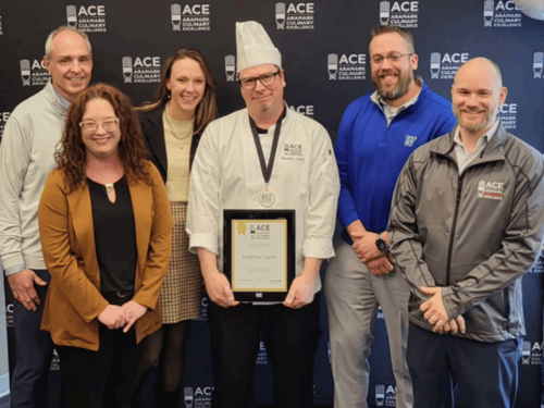 Chef Matthew Clarke and others accepting an award